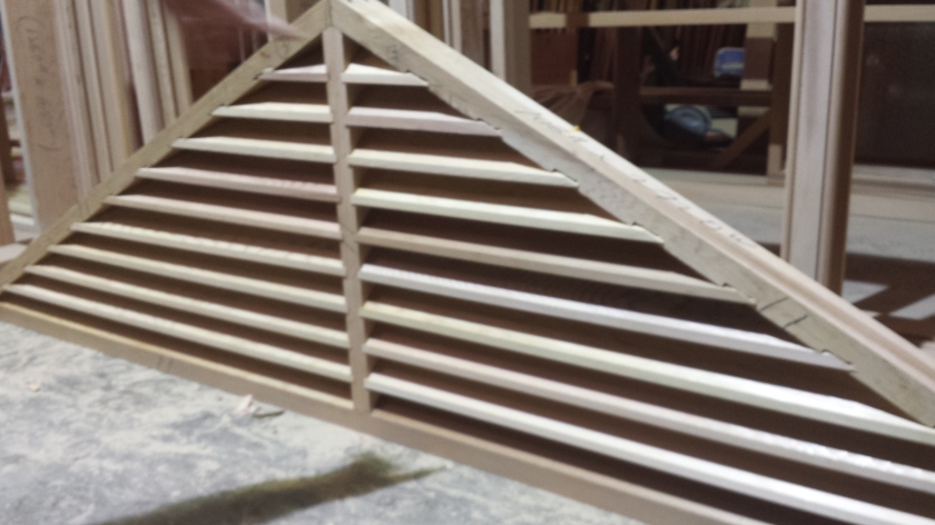 Western Red Cedar Gable window with fixed timber louvre slats - slats notched into the frame not nailed over the top. work in progress. flywire to be added on back, and finished nearly on facia with extra timber beading. LOTS of manhours.