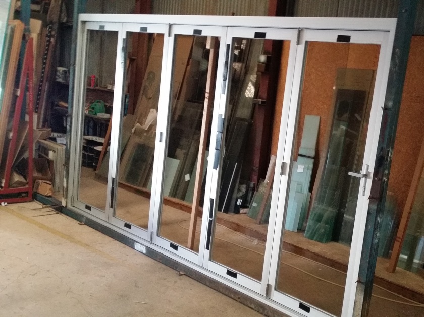 5 panel clear anodise bifold door.  Hawkesbury suite from ALSPEC.